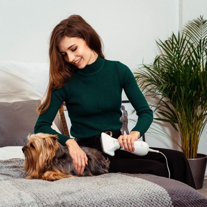 Brosse avec sèche-cheveux pour le toilettage des animaux